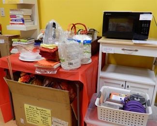 Seasonal Decorations, Misc paper products, All types and BPM's of Workout Music, Baskets, Mugs, Nutrition, Recipe and Diet Books, Microwave, and Butcher Block Rolling Cart with Drawer