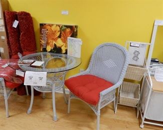 Pier 1 - Santa Barbara Bistro Set with Table, 4 Captains Chairs and Red Tomato Cushions. Also included in the picture are 2 Bright Red High Pile Rectangular Rugs, 2 Multi Red Round High Pile Rugs, Shelving (sold) Wall Mirror and Hamper