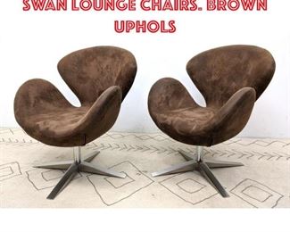 Lot 1072 Pr Arne Jacobsen style Swan Lounge Chairs. Brown uphols