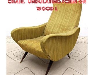Lot 1223 ITALIAN MODERN Lounge Chair. Undulating form on Wood L