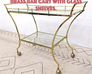 Lot 1453 Mid Century Modern Brass Bar Cart with Glass Shelves. 