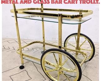 Lot 1455 Light Weight Gold Tone Metal and Glass Bar Cart Trolly.