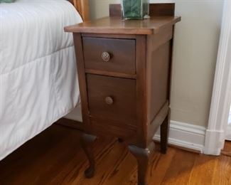 One of a pair of nightstands