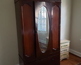 Edwardian style mahogany armoire with center mirror door