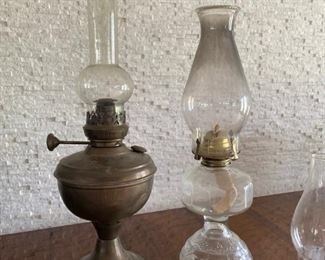 Assorted antique hurricane lamps