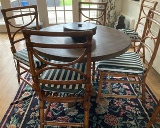 Round table with iron base and round wood top- Bamboo chairs