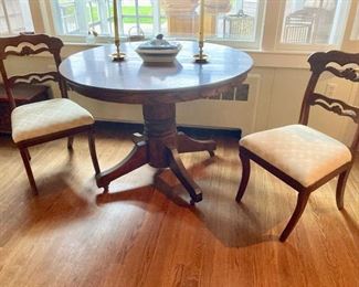 Antique oak table -w/ 2 leaves . Pair of antique chairs