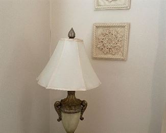 5. Pair of mismatched lamps and 4 wall reliefs and one print $75