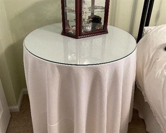 8. Small tabletop curio with jewelry and figureines inside as well as a pair of mother of pearl opera glasses binoculars. Some antique foreign coins as well.    One pin which is a marked piece of 14k Gold (shown with coins) $125 all