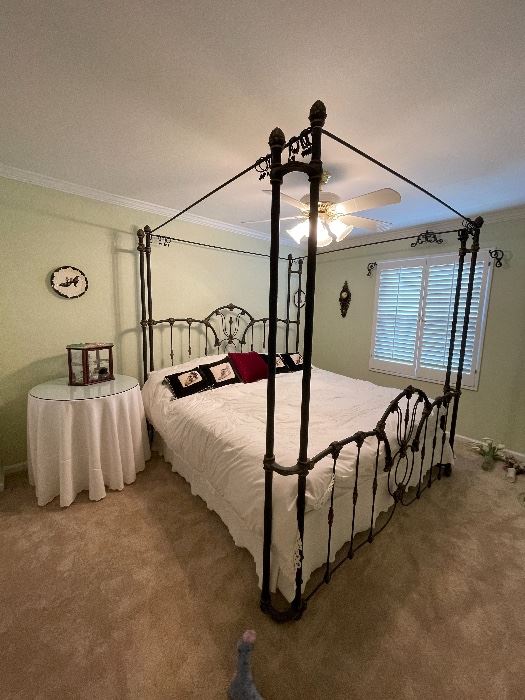 9. Iron post bed with curtain rods for privacy in this bed (or a mosquito net!).  Includes table on side as well.  No wall hangings included.  Kiler style. King Size!  $495