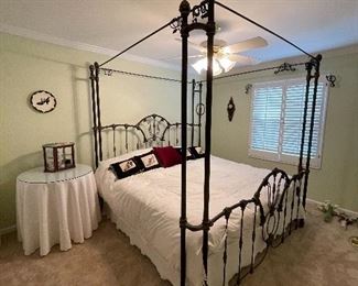 9. Iron post bed with curtain rods for privacy in this bed (or a mosquito net!).  Includes table on side as well.  No wall hangings included.  Kiler style. King Size!  $495