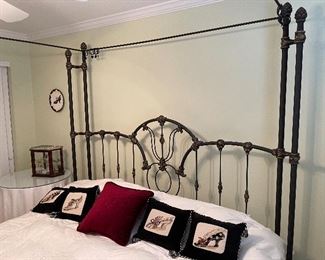 9. Iron post bed with curtain rods for privacy in this bed (or a mosquito net!).  Includes table on side as well.  No wall hangings included.  Kiler style. King Size!  $495