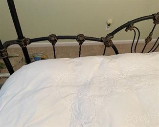 9. Iron post bed with curtain rods for privacy in this bed (or a mosquito net!).  Includes table on side as well.  No wall hangings included.  Kiler style. King Size!  $495