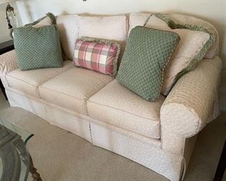 11. Nice upholstered sofa with pillows $325