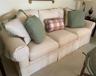 11. Nice upholstered sofa with pillows $325