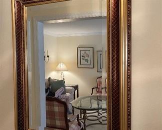 16. Mirror and plates with hangers $85