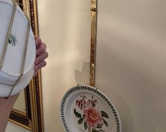 16. Mirror and plates with hangers $85