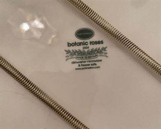 16. Mirror and plates with hangers $85