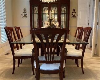 20. Excellent modern dining table with a wood base, beveled glass top and 6 chairs (2 of which are arm chairs).  Excellent condition.  One chair has a stain that looks like a drop of some liquid on the corner, otherwise perfect.  $495 table and chairs