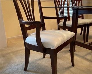 20. Excellent modern dining table with a wood base, beveled glass top and 6 chairs (2 of which are arm chairs).  Excellent condition.  One chair has a stain that looks like a drop of some liquid on the corner, otherwise perfect.  $495 table and chairs
