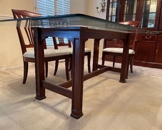 20. Excellent modern dining table with a wood base, beveled glass top and 6 chairs (2 of which are arm chairs).  Excellent condition.  One chair has a stain that looks like a drop of some liquid on the corner, otherwise perfect.  $495 table and chairs
