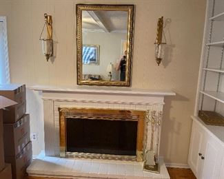 29. Nice black and gold gilded mirror with 2 large candlestick brass sconces  And Fireplace tools $150