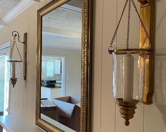 29. Nice black and gold gilded mirror with 2 large candlestick brass sconces  And Fireplace tools $150