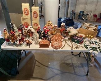 33. Table contents of Christmas items including ceramic gingerbread dishes, carolers and more $65 all