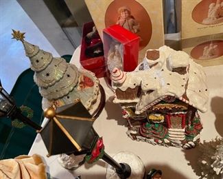33. Table contents of Christmas items including ceramic gingerbread dishes, carolers and more $65 all
