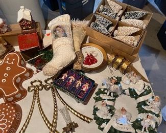 33. Table contents of Christmas items including ceramic gingerbread dishes, carolers and more $65 all