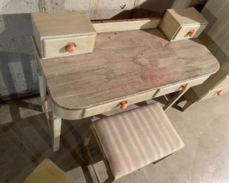 36. Nice set of art deco modern dresser, vanity, stool, nightstand and extra small table.  All were antiqued in the 70s, and have wear.  One handle is loose.  No other real issues to mention. $300 all