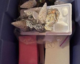 40. Hawthorne Village and Ashton Drake Christmas Village lot.  There a few Small accessory pieces in the blue tub.   Boxes leaning on wall are bases for ice skating rinks, etc.  The Christmas tree is awesome!  $195  all