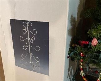 45. Christmas trees, stands, wreath holder, and a cool peppermint candy plant stand of some kind.  So cool.  $65