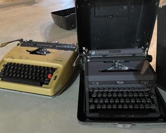 49. Set of 4 typewriters and one adding matching.  Royal and remington and more $75