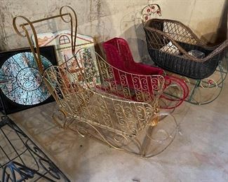 51. Set of 4 sleighs, and some prints.  Prints are fantastic.  High detail stained glass window impressions. $65