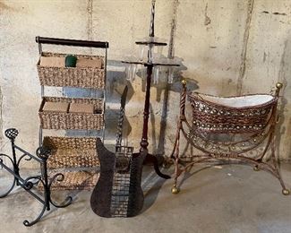 52. Lot of 5 pieces, guitar cd rack, wicker basket rack, magazing stand, glass vase 2 tiered table, and a cool decorative bassinet $70