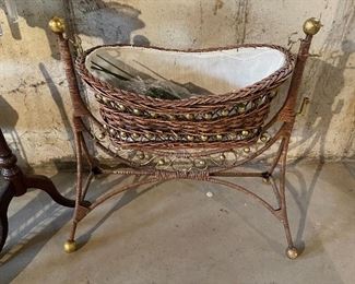 52. Lot of 5 pieces, guitar cd rack, wicker basket rack, magazing stand, glass vase 2 tiered table, and a cool decorative bassinet $70