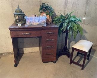 52. Sewing machine table (no machine inside), plant stand, small bench and old ceramic doll parts $65