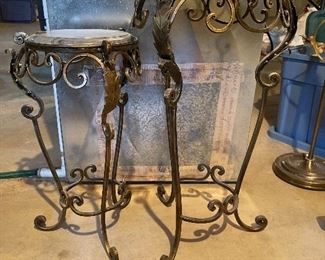 57. Two matching tables of different heights.  Marble table tops. $55