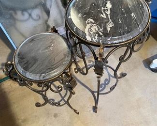 57. Two matching tables of different heights.  Marble table tops. $55