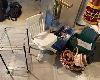 54. Small bar cart, rollling old wood chair painted white, baskets, heavy brass lamp and $55
