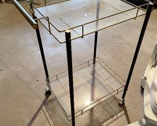 54. Small bar cart, rollling old wood chair painted white, baskets, heavy brass lamp and $55