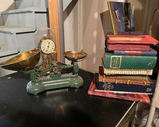 65. Old Scale with brass pans, globe clock and some books $45