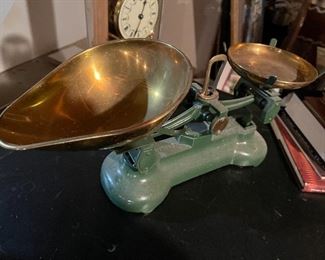 65. Old Scale with brass pans, globe clock and some books $45
