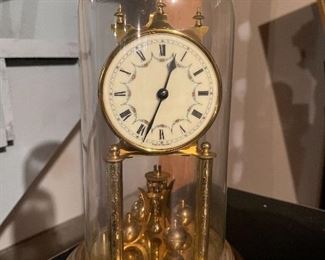 65. Old Scale with brass pans, globe clock and some books $45