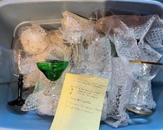 66. Tub of glassware including green hobnail, older crystal and more $100