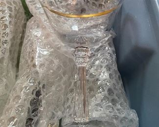 66. Tub of glassware including green hobnail, older crystal and more $100