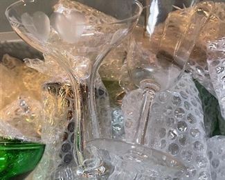 66. Tub of glassware including green hobnail, older crystal and more $100