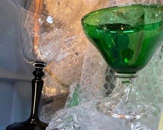 66. Tub of glassware including green hobnail, older crystal and more $100
