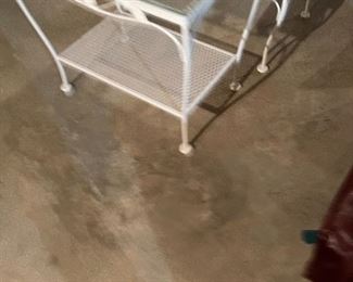 68. 2 metal tables with glass tops and one tricycle planter $40